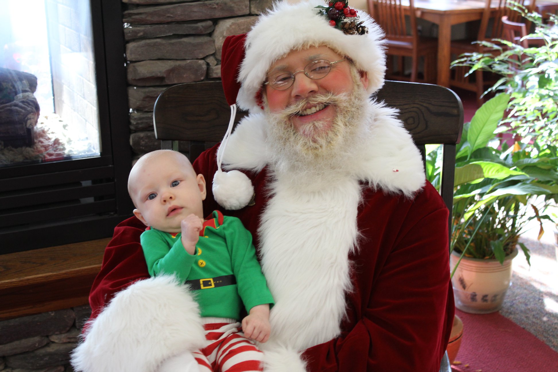 Santa holding baby