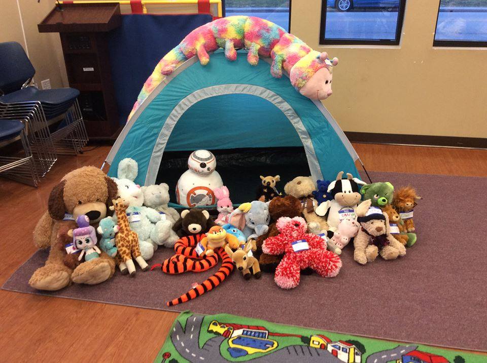 Stuffed animals in a tent