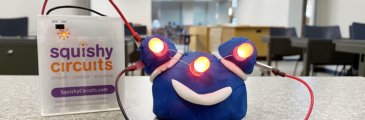 Squishy Circuits creation with glowing eyes and nose