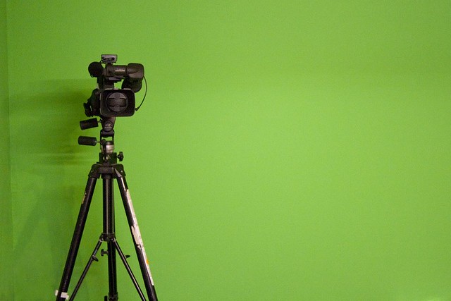 camera in front of a green screen