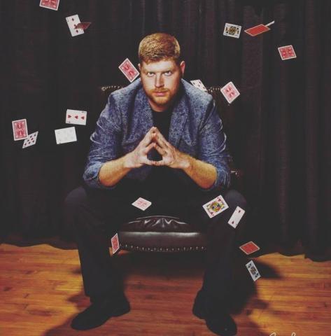 Dan Luckett with playing cards.