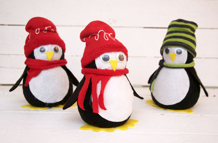 penguin plushies in scarves and hats