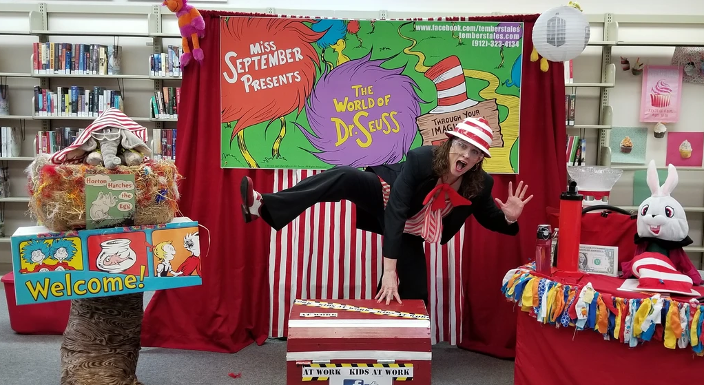 Miss September performing Letting Loose with Sr. Seuss at a library