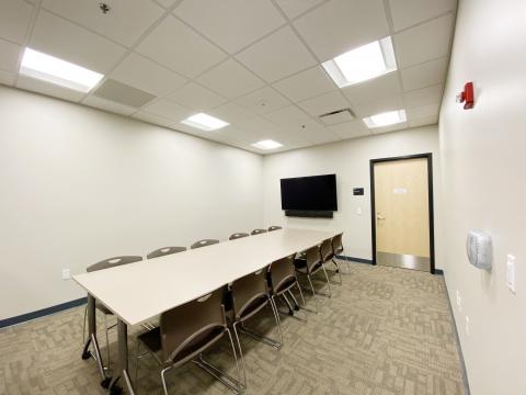 Main Floor Conference Room #136 with conference table and multiple chairs