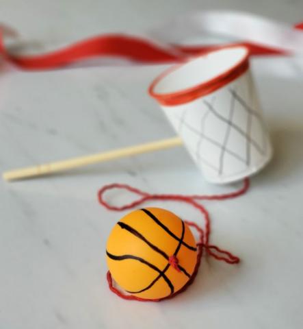 basketball themed cup and ball game
