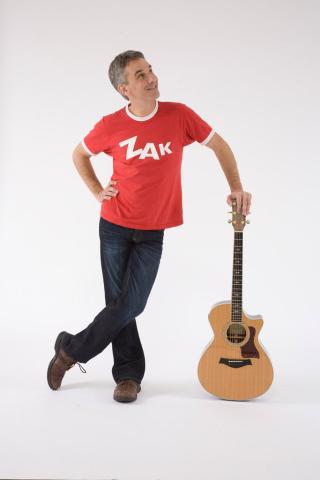 Zak Morgan with a guitar