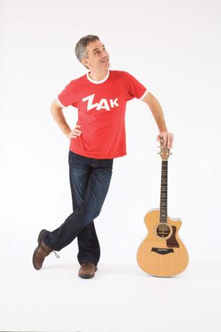 Zak Morgan with a guitar