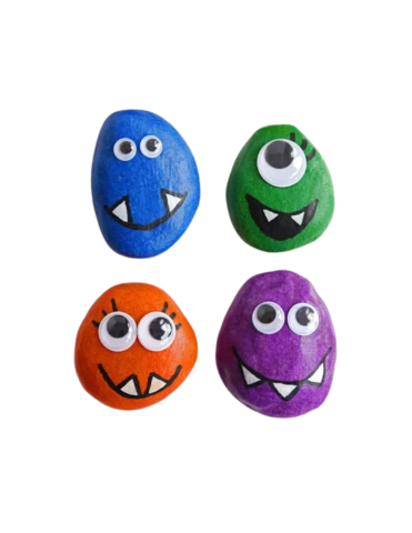 image of rocks painted like monsters