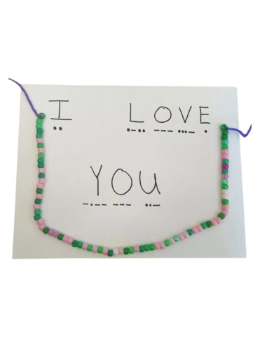 Image of a Morse code bracelet that says "I Love You"