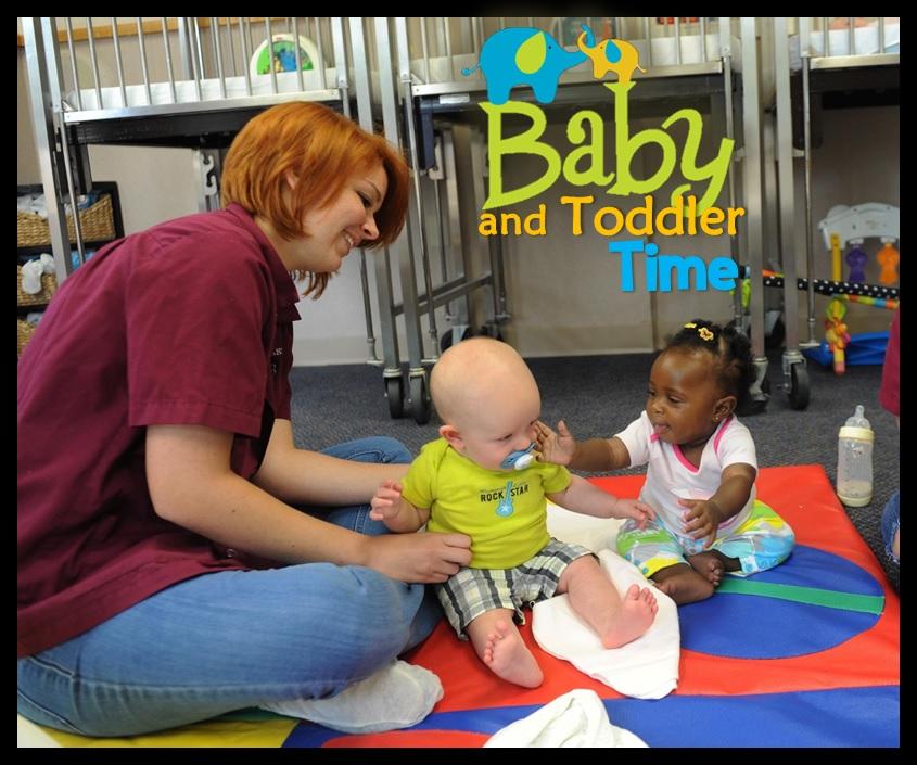 Two babies and caregiver during Baby and Toddler Time