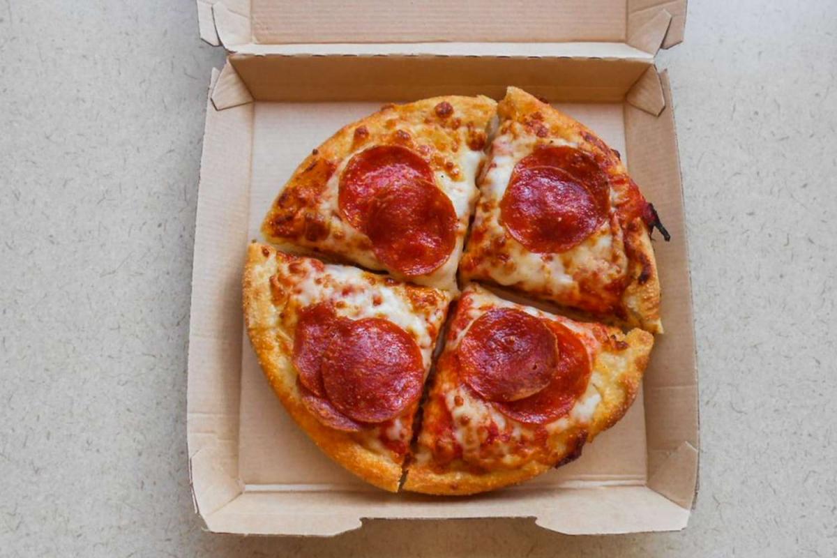 image of pizza in a box