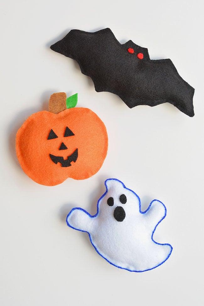 image of bat, pumpkin, and ghost plushies